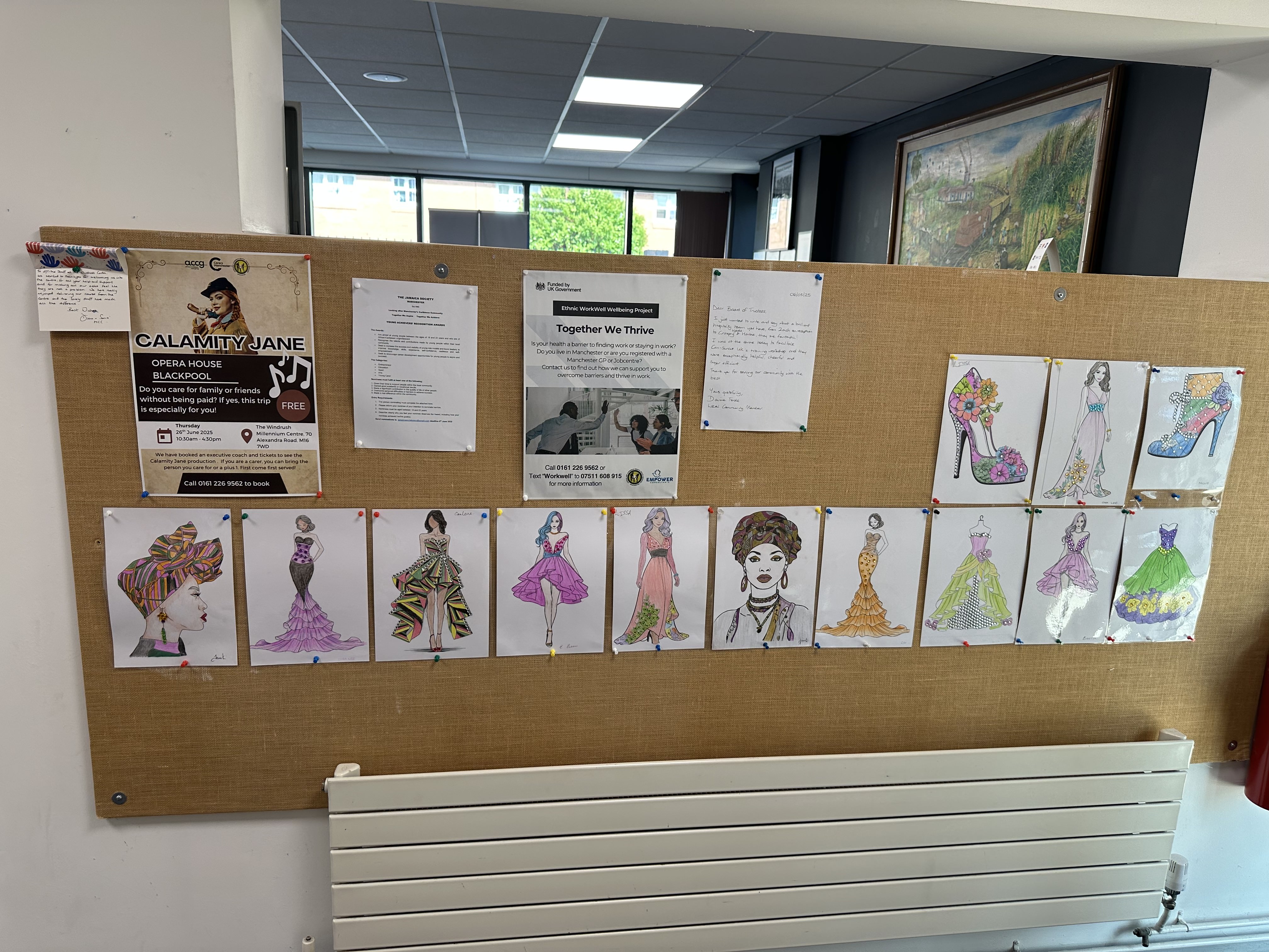Display board showing completed artwork from sessions